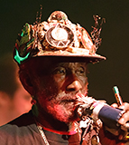 Lee 'Scratch' Perry at Popfest 2015, by Manfred Werner - Tsui - Eigenes Werk, CC BY-SA 3.0, https://commons.wikimedia.org/w/index.php?curid=47621462